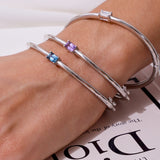 - The Radiant London Blue Topaz Bracelet -