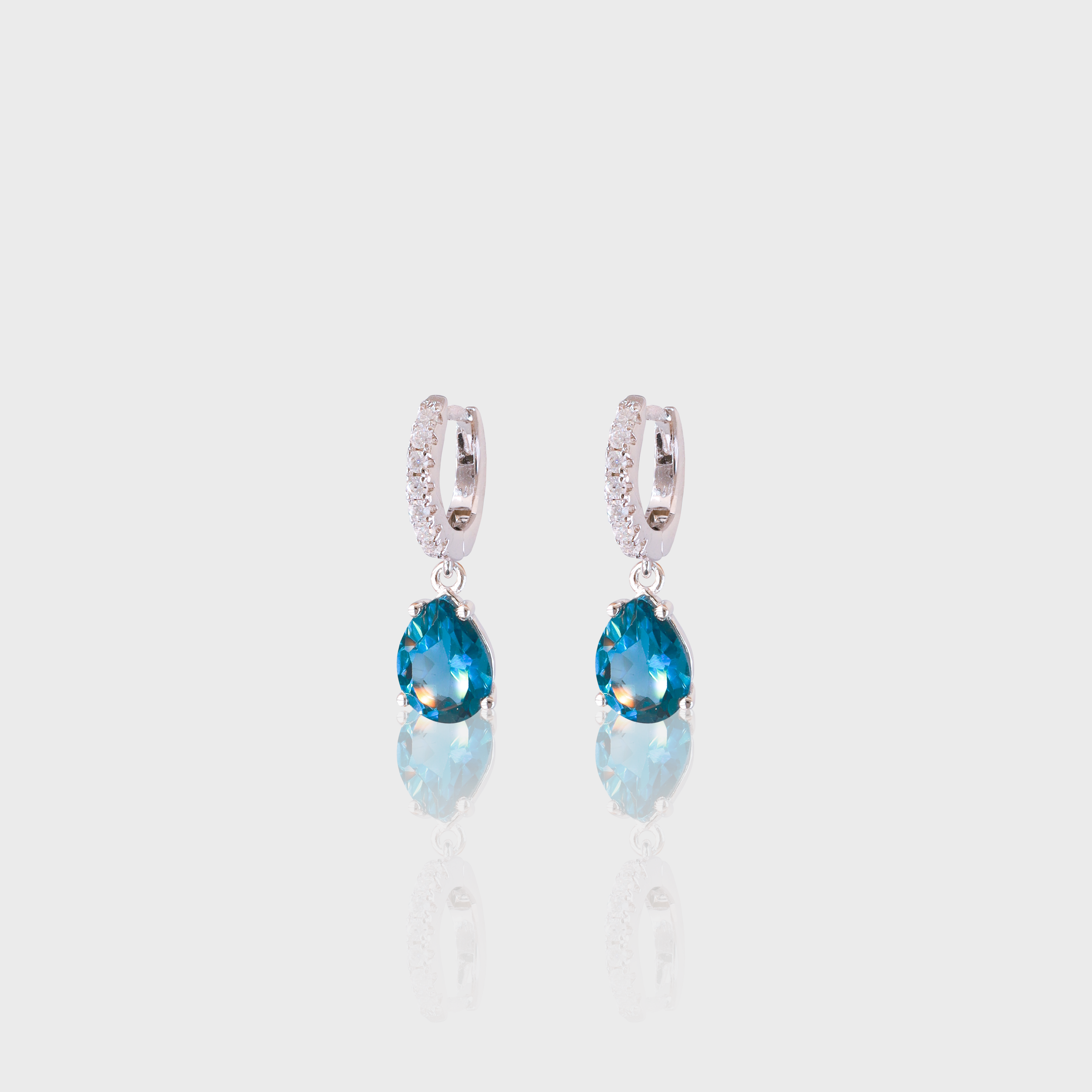 - The Dainty London Blue Topaz Hoops -