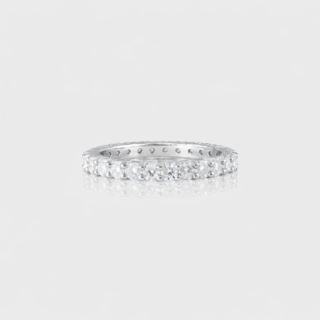 - The Petite Moissanite Ring -